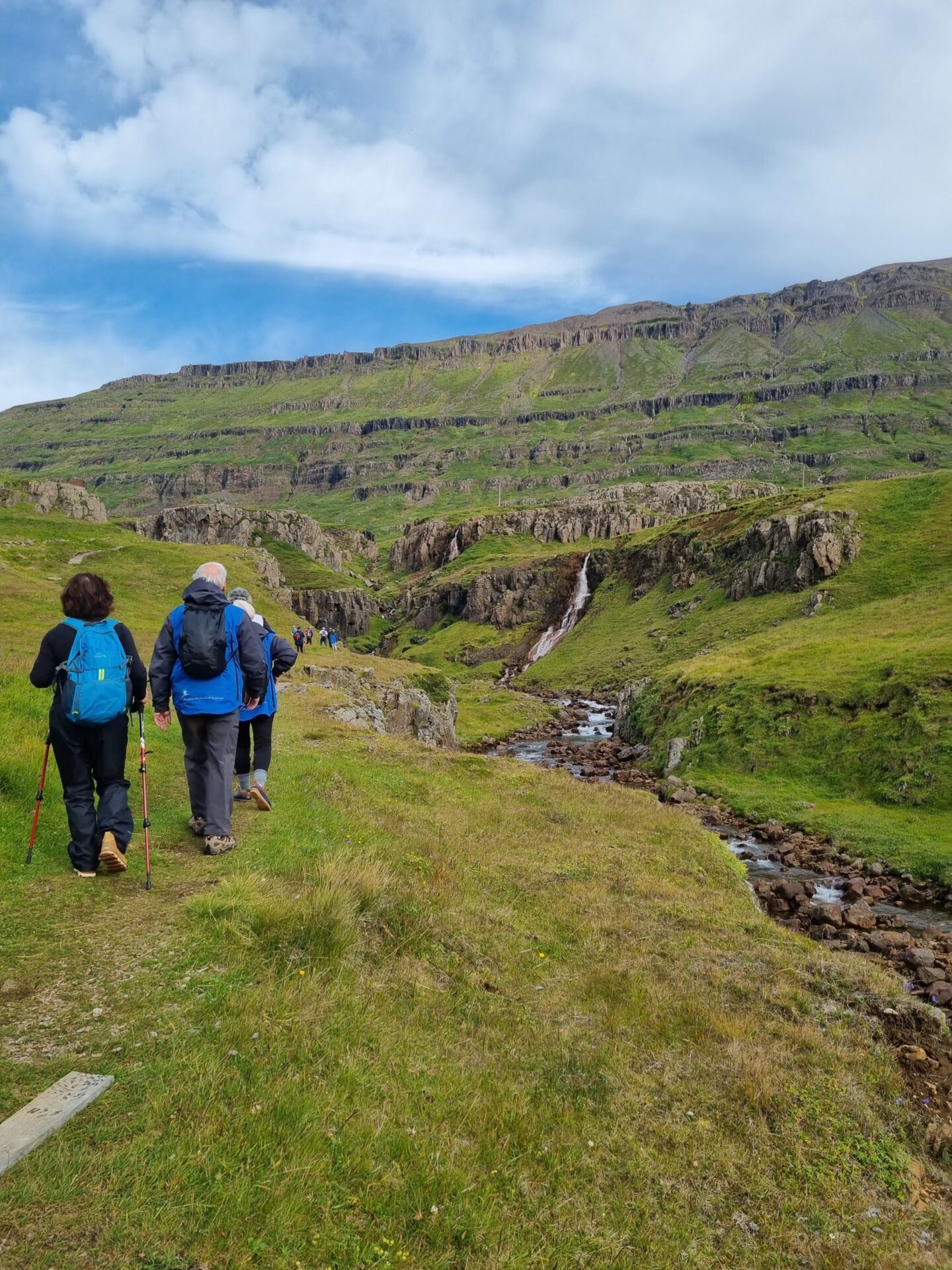 Hikers exploring Seydisfjordur, Iceland